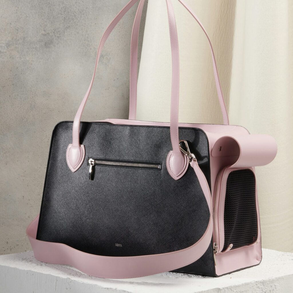 black and pink leather handbag