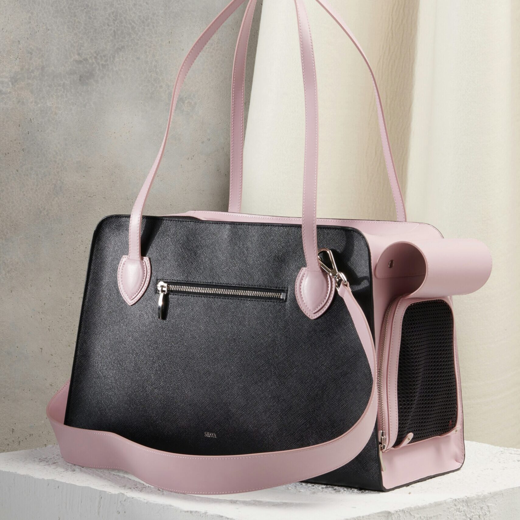 black and pink leather handbag
